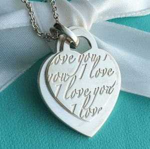 Retired double heart tag I love you necklace